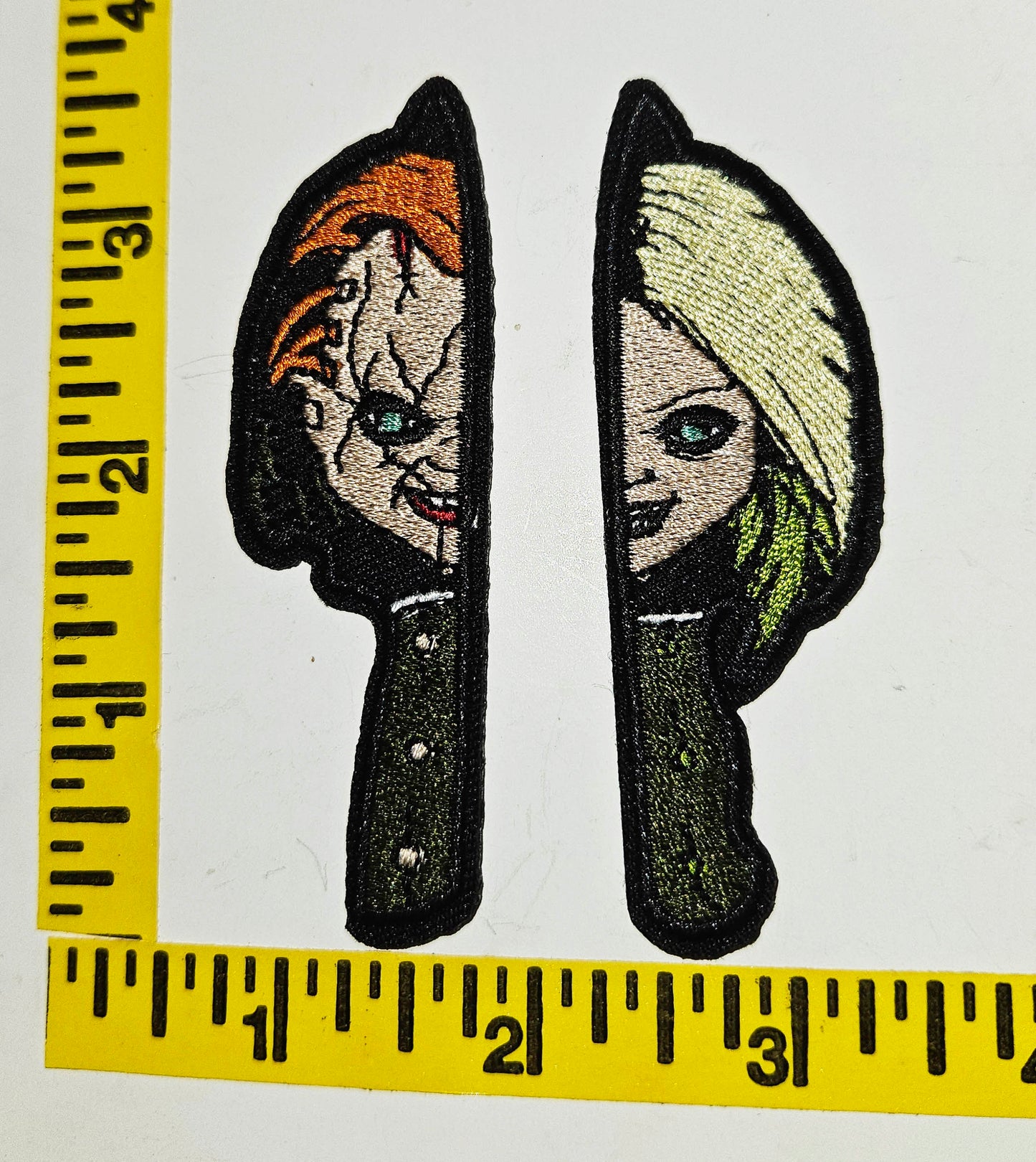 Chucky and his bride on Knife blade 3.25 in x 1 inch Cut out Iron-on 2 Patch NEW