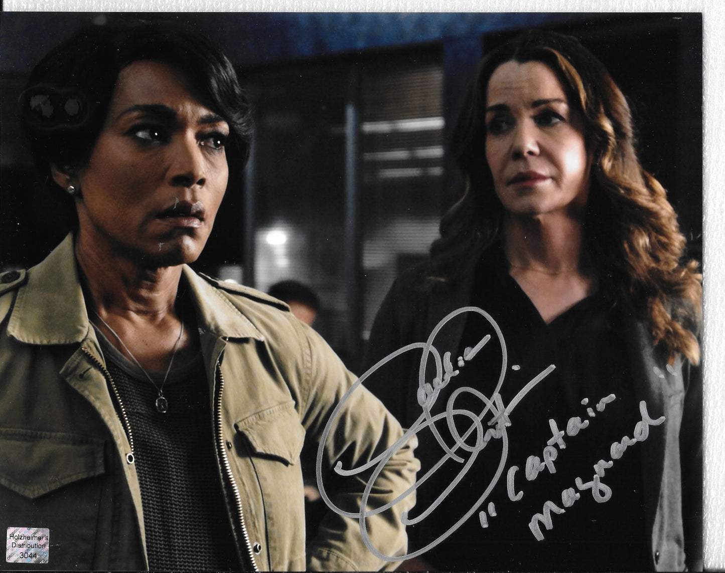 Claudia Christian 8inchx10inch AUTOGRAPH photo with Character name 9-1-1 Capt Maynard