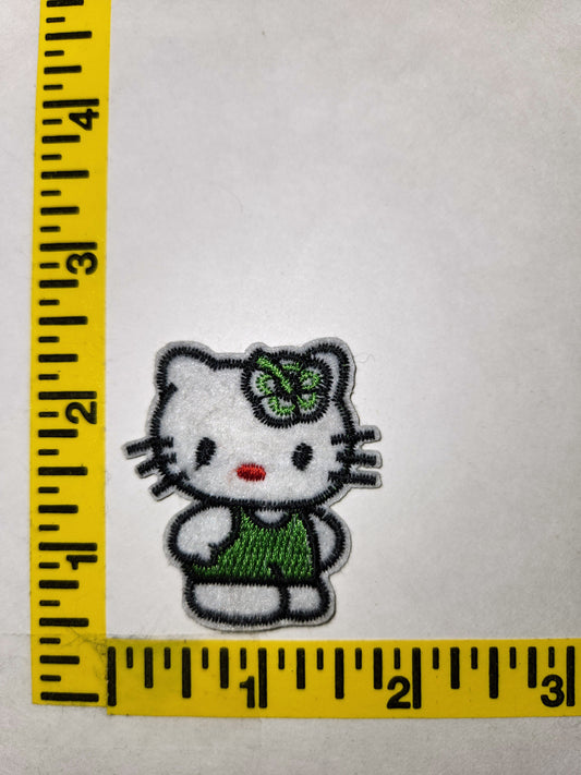 Hello Kitty (Pop-culture) - Embroidered Patch, NEW 2in roughly cut out - Green